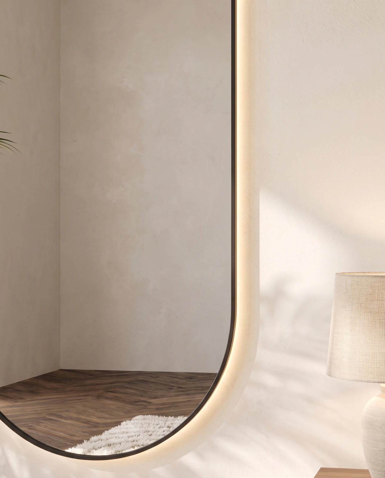 Elara black backlit oval wall mirror in a Dubai bathroom
