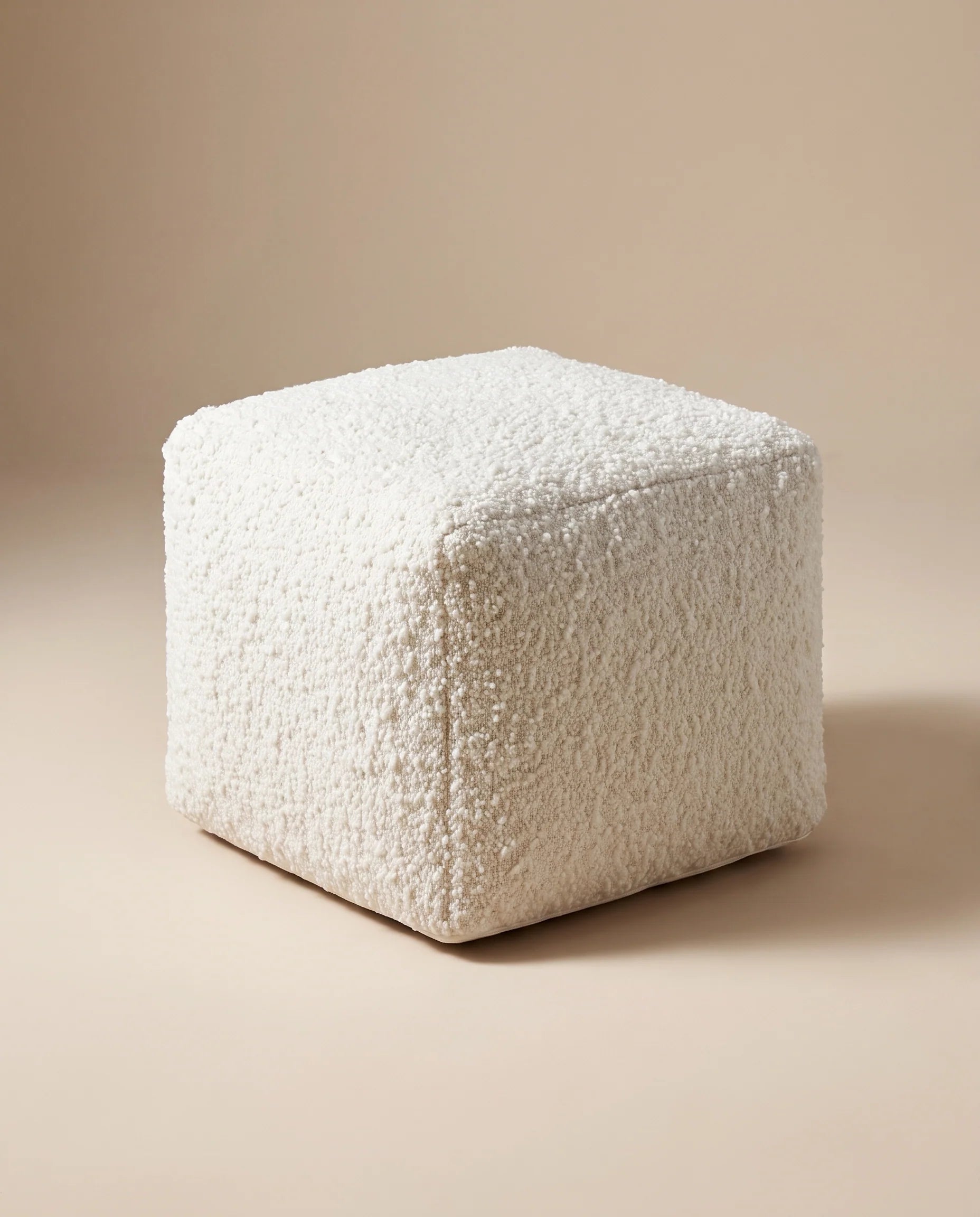 Juno ivory bouclé round floor pouf