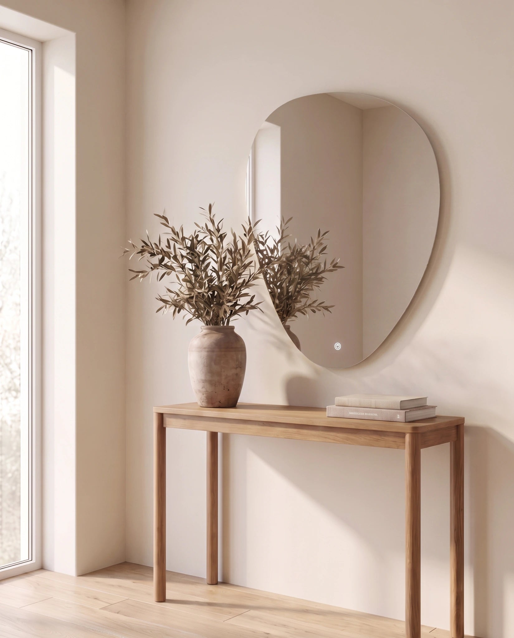 Isla frameless irregular LED mirror, close-up of the lit edge