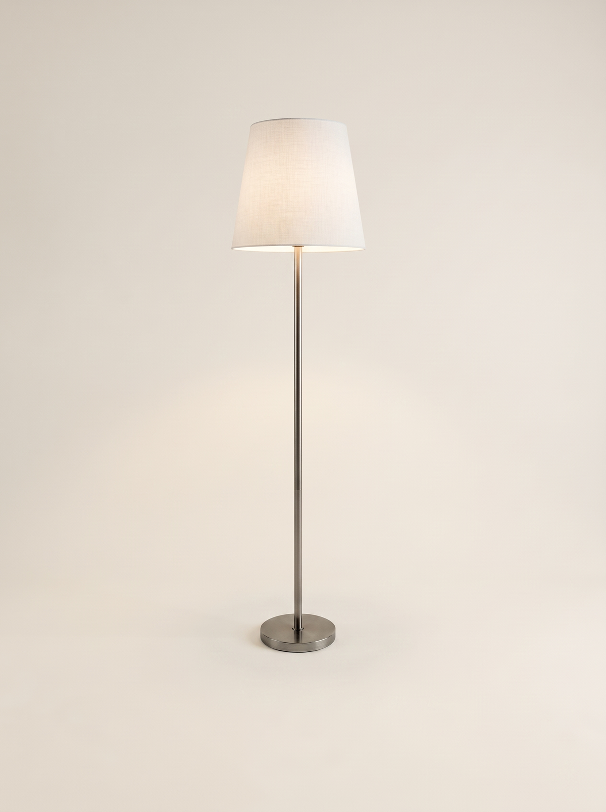 White linen shade floor lamp with brushed satin nickel pole