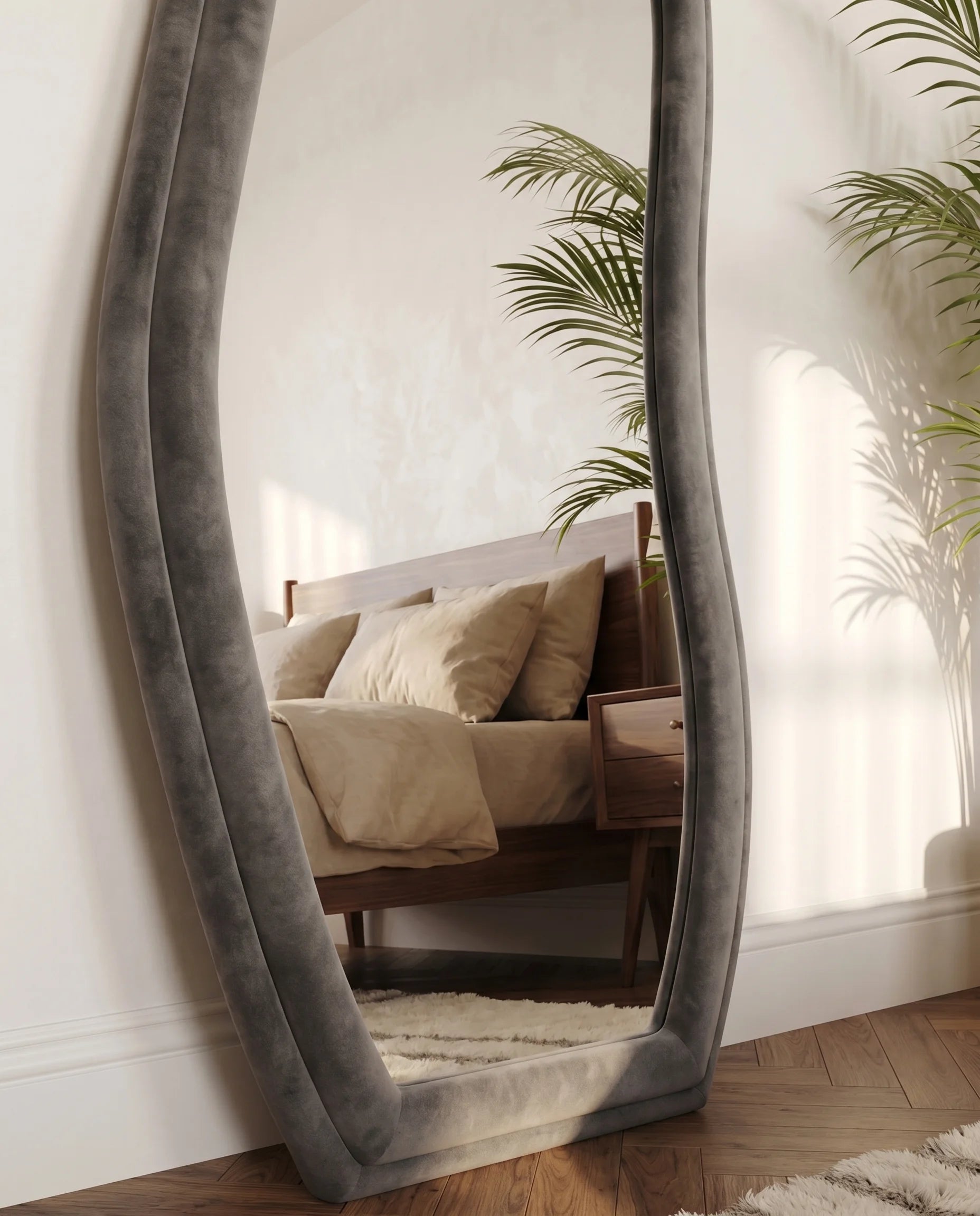 Ottilie black irregular mirror, close-up of the soft fabric frame