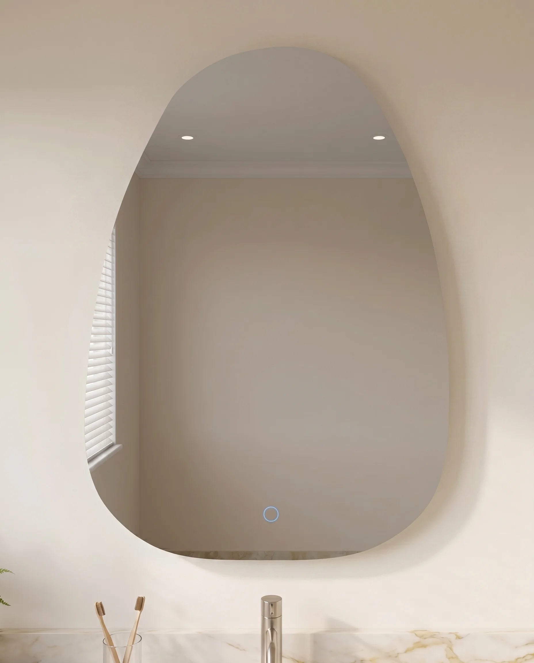 Salma lighted frameless freeform mirror in a Dubai bathroom