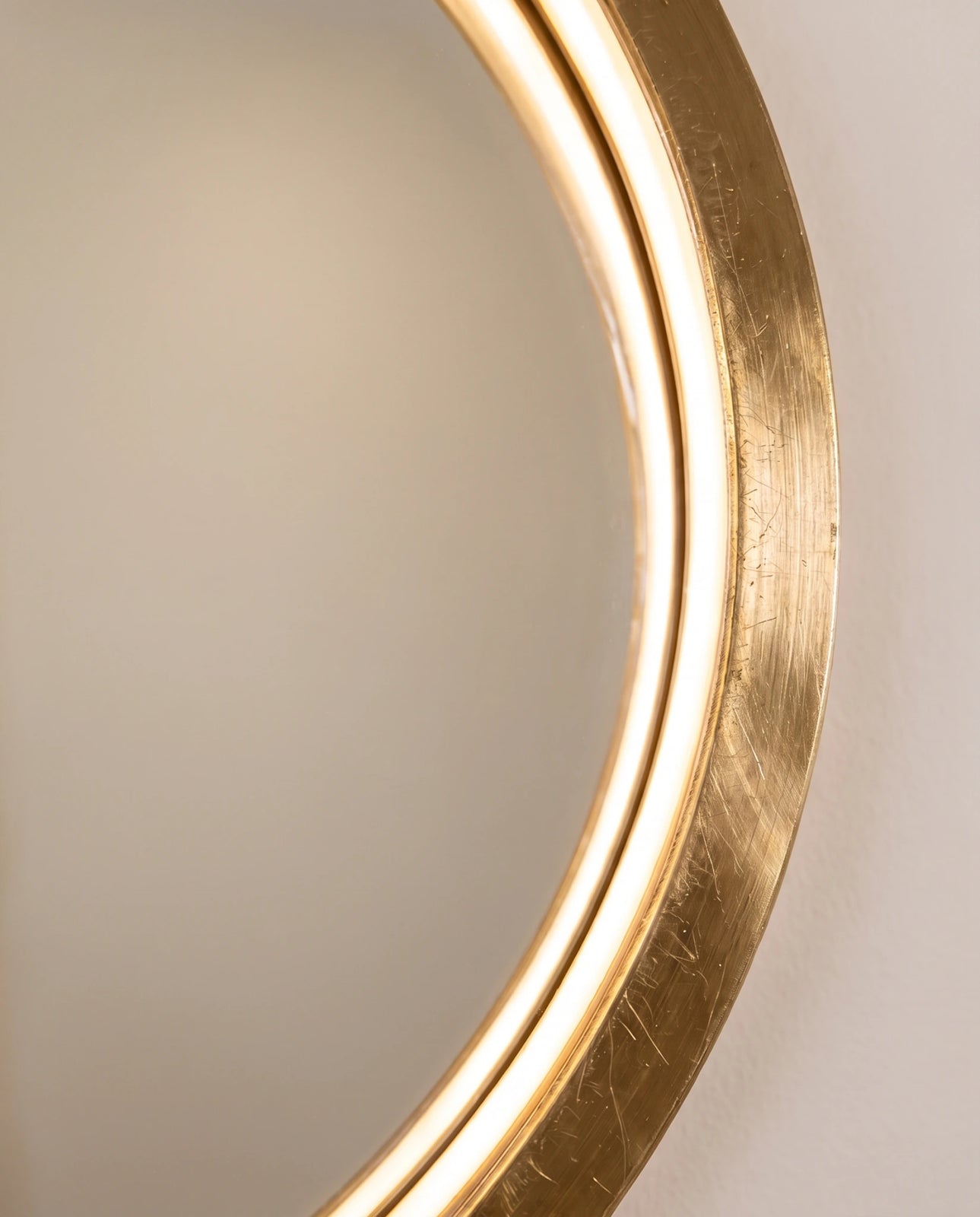 Selene gold round LED wall mirror in a Dubai bathroom